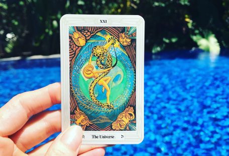 The Universe or world Tarot card, taken in front of the beautiful pool at Sanur, Bali at the Taksu hotel